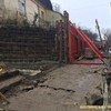 Біля міськради рятують будинки від завалення